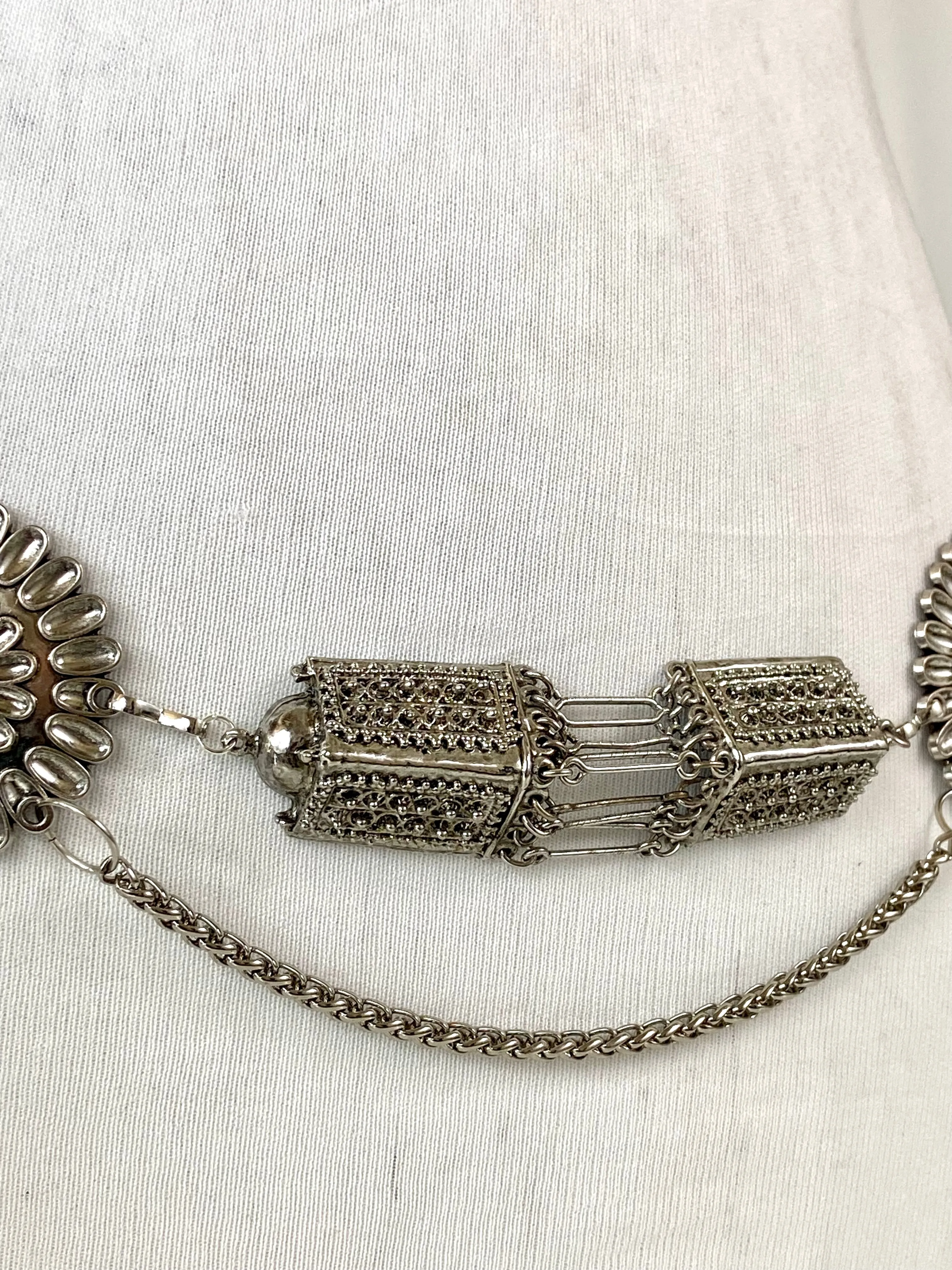 Silver red tone waist belt