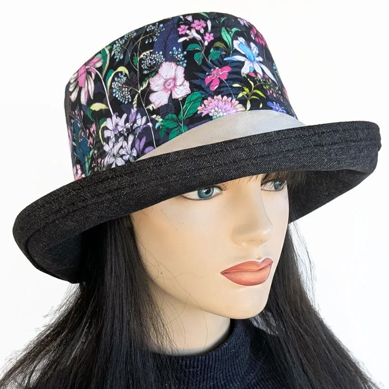 Sunblocker UV summer sun hat with wide brim, featuring pretty flowers on black, adjustable fit